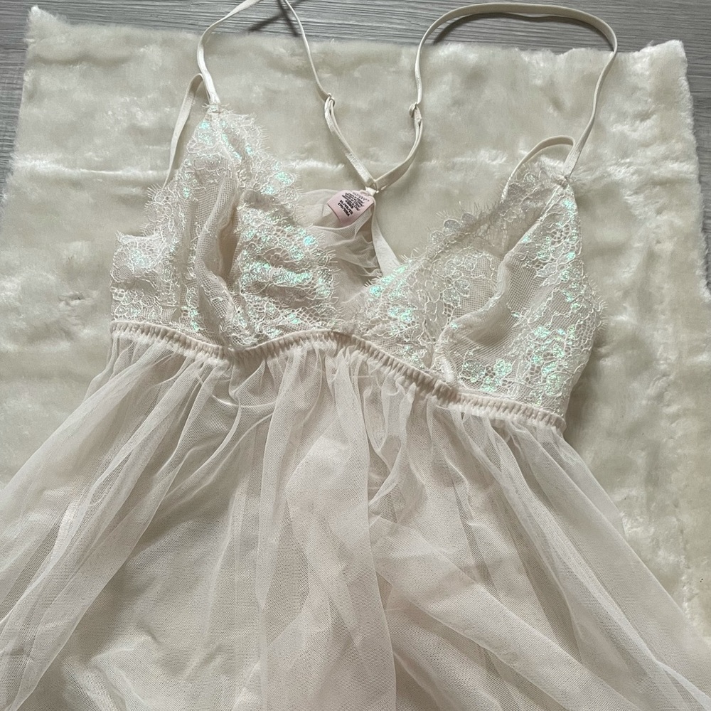 White lingerie with pink reflexes